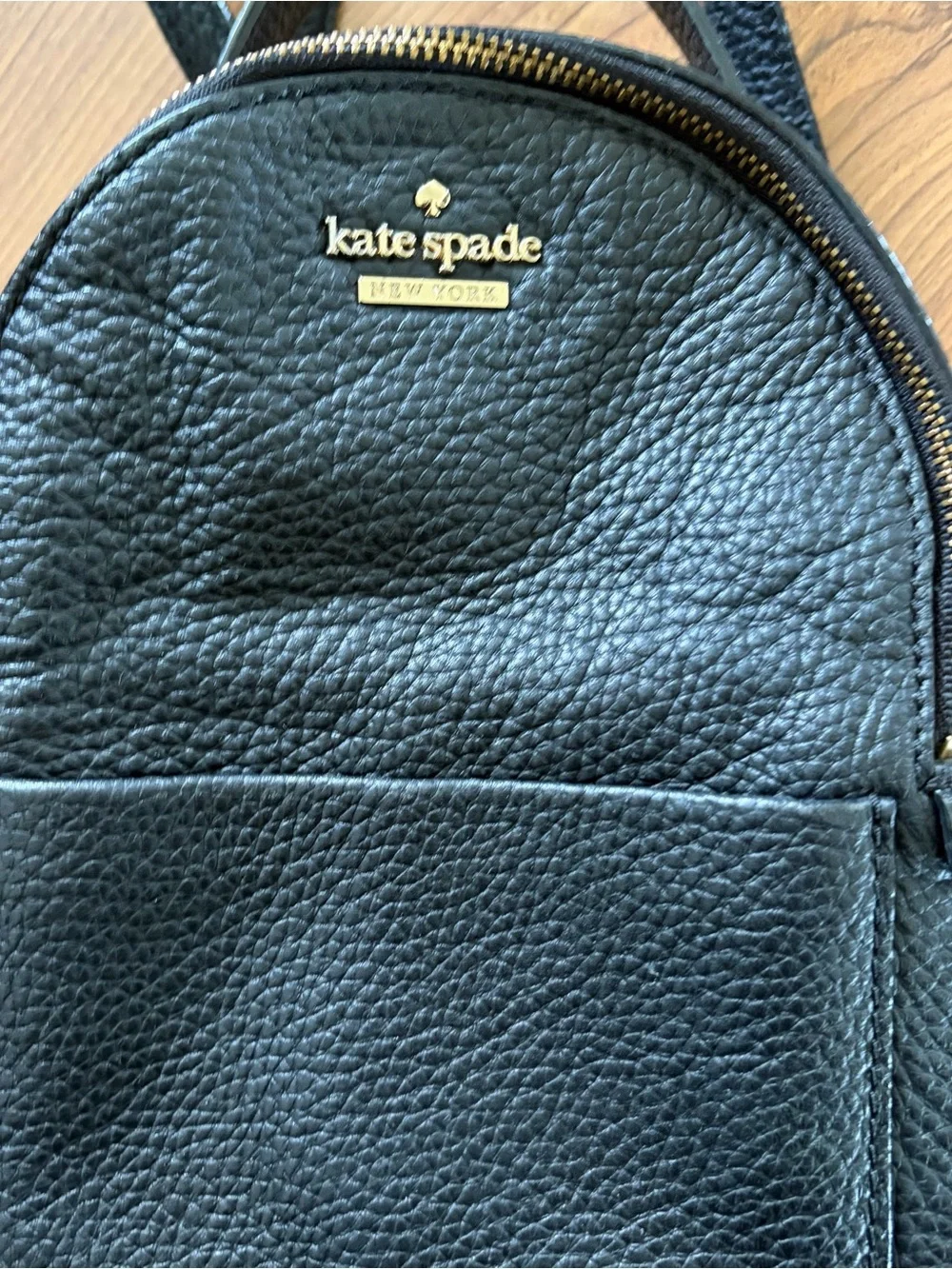 kate Spade woman’s Black Pebbled Leather Mini Backpack